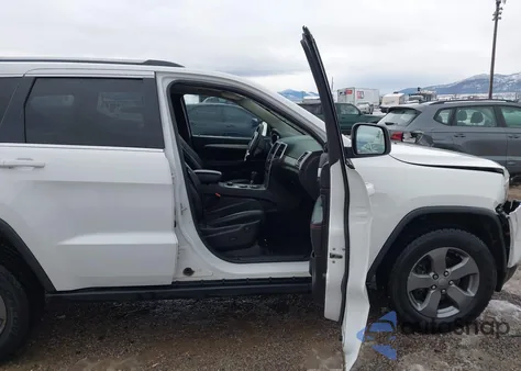 2013 Jeep Grand Cherokee Laredo Trailhawk z USA, uszkodzony, nr VIN 1C4RJFAT9DC591384